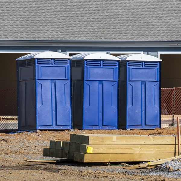 are there any additional fees associated with portable restroom delivery and pickup in Inman